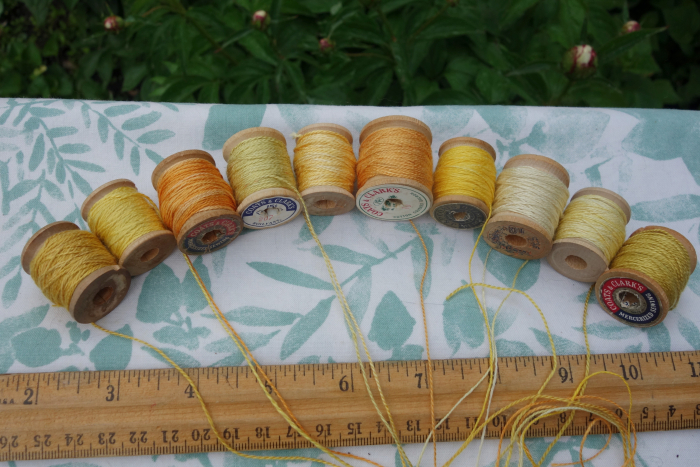 yellow and orange plant dyed silk threads