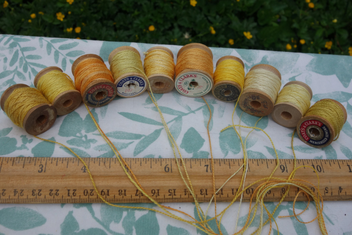 yellow and orange plant dyed silk threads