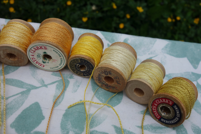 yellow and orange plant dyed silk threads