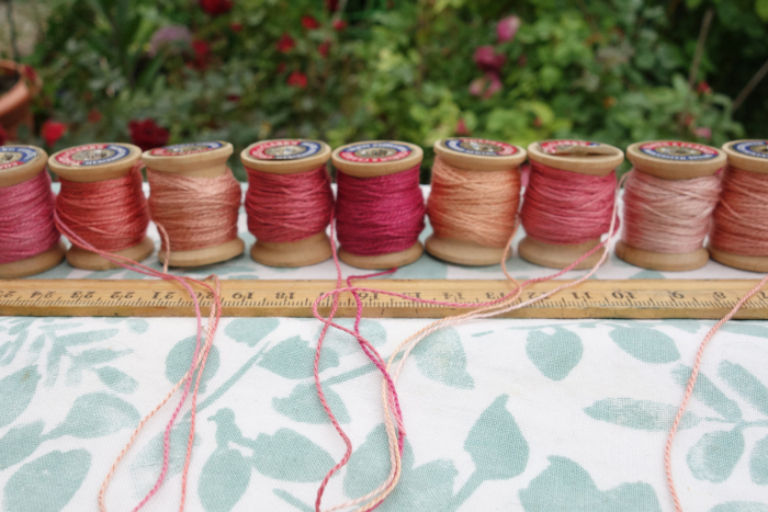 naturally dyed silk thread shades of pink peach and rose