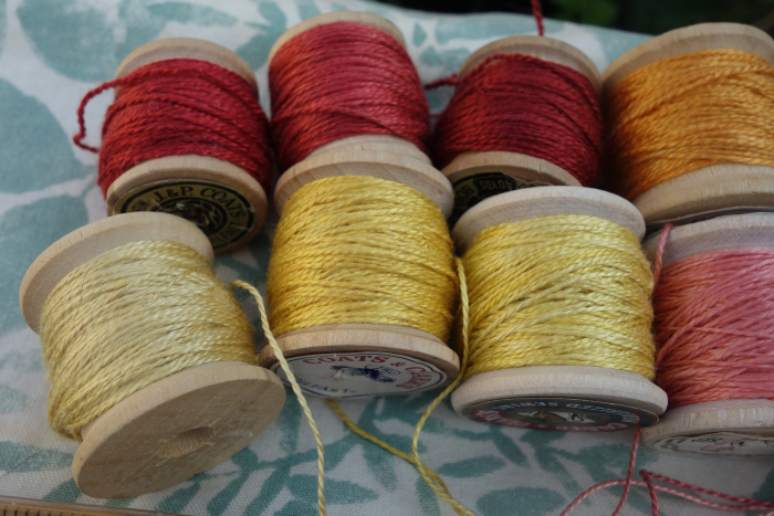 silk embroidery thread dyed with flowers and madder roots
