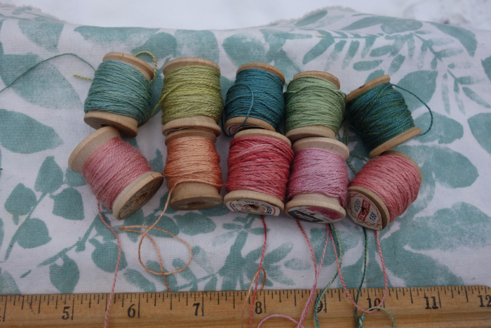 naturally dyed shades of green and pink silk thread